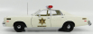 Greenlight Plymouth Fury Hazzard Police Rosco Patrol Car 1977 1:18 Bílá