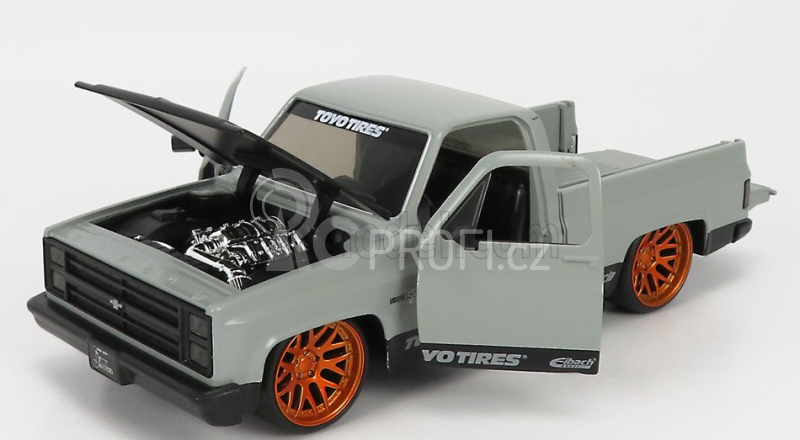 Jada Chevrolet C-10 Pick-up Toyo Tires 1985 1:24 Matná Šedá Černá